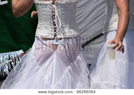Munich, Germany - 11 July 2015: Christopher Street Day - A man in a torn bridal dress