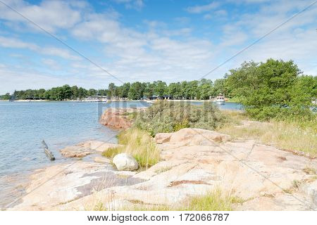 Glittering sea small islets and rocks in the archipelago in Aaland Finland