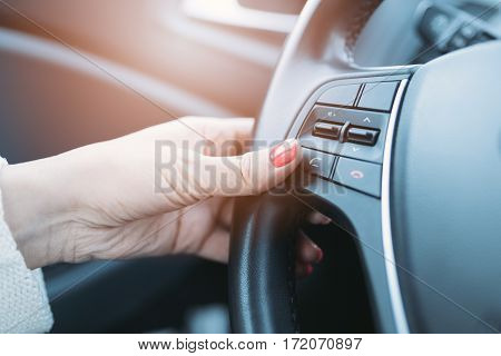 Woman Pressing Green Phone Control Button