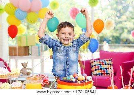 Children's funny birthday party in decorated room