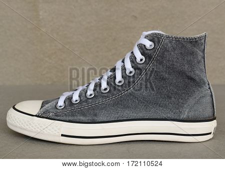 close up vintage style of sport gray sneaker shoes on white background