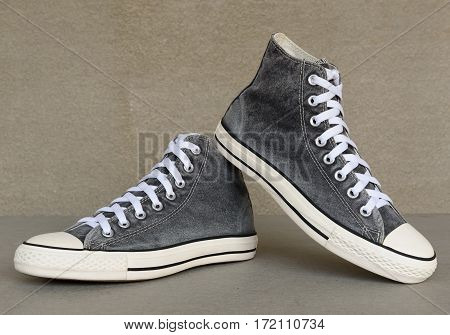 close up vintage style of sport gray sneaker shoes on white background