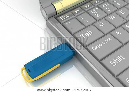 USB disky a laptop izolovaných na bílém