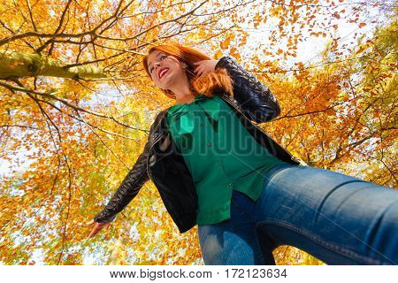 Leisure relax nature joy loud voice concept. Girl having fun in forest. Cheerful lady yelling screaming in autumnal woodland. Wide angle view
