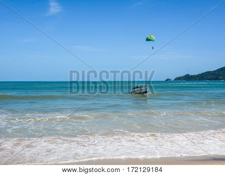 People Playing Parasailing In Phuket, Thailand