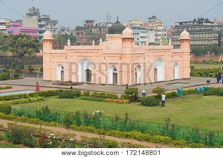 DHAKA, BANGLADESH - FEBRUARY 22, 2014: Unidentified people visit mausoleum of Bibipari in Lalbagh fort in Dhaka, Bangladesh.