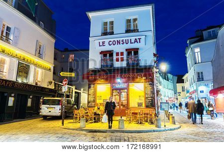 Paris France-February 15 2017: The cafe Le Consulat at night located in Montmartre area of ParisFrance.