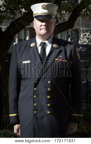 NEW YORK - 11 NOV 2016: 2016 Grand Marshal Joseph Duggan Jr., NY Fire Dept Battalion Chief, U.S. Army Veteran at the Eternal Light Monument wreath laying ceremony, Madison Square Park, Veterans Day.
