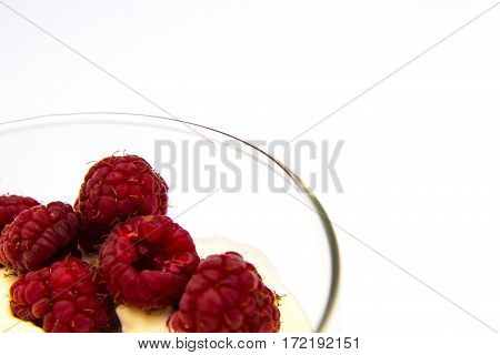 raspberry witth sauer cream in isolated white background