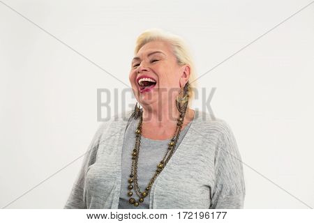 Senior woman laughing isolated. Cheerful elderly female.