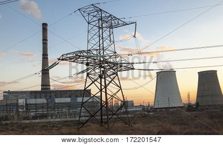 Cogeneration plant near Kyiv Ukraine. Electricity pylon in the foreground.