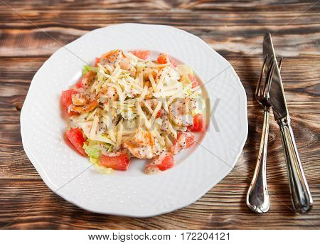 Tasty Shrimps And Grapefruit Salad Decorated With Cheese
