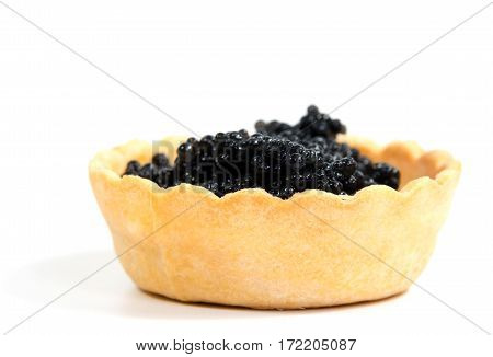 Caviar in tartlet isolated on white background
