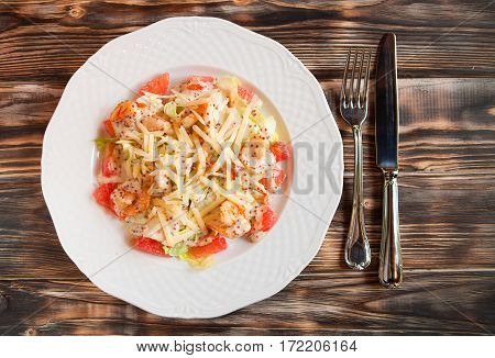 Tasty Shrimps And Grapefruit Salad Decorated With Cheese