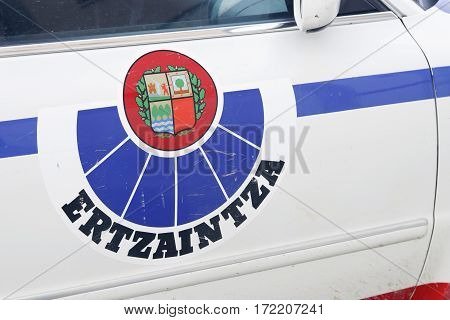 VITORIA SPAIN - FEBRUARY 19 2017: Ertzaintza logo in one of their cars. Ertzaintza is the police force for the autonomous community of Basque Country Spain.