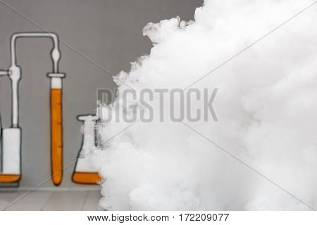 A lot of smoke and steam in the chemical laboratory. Thick white smoke formed during chemical experiments