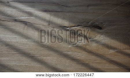 Gate Shadow on Cracked Durmast Wood Background