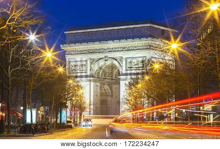 The Triumphal Arch in evening Paris France.
