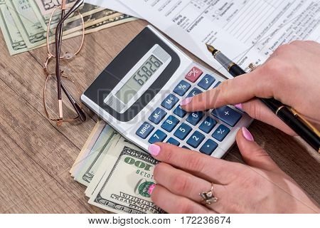 Business Lady Filling Tax Form. 2017. Financial Concept.