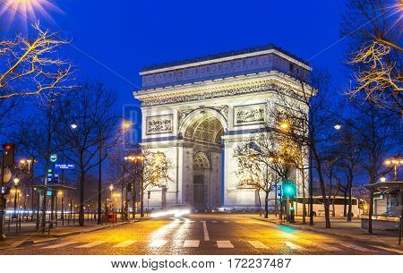 The Triumphal Arch in evening Paris France.