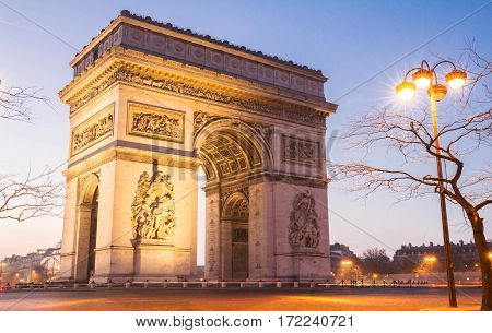 The Triumphal Arch in evening Paris France.