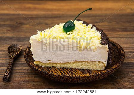 Cake piece Pigeon milk on plate. Stdio Photo
