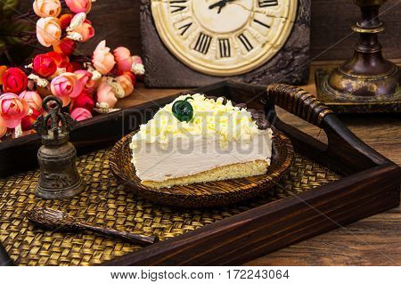 Cake piece Pigeon milk on plate. Stdio Photo