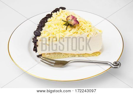 Cake piece Pigeon milk on plate. Stdio Photo