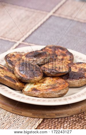 Baked Potatoes With Shell Served On The Plate