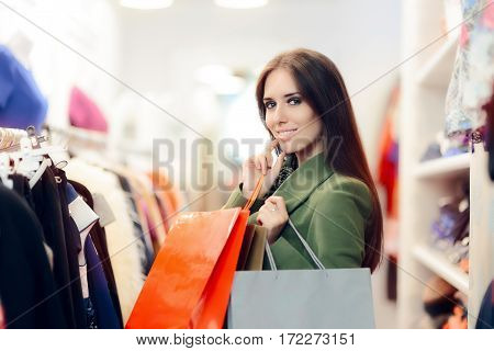 Elegant Shopping Woman Wearing a Green Coat in Fashion Store