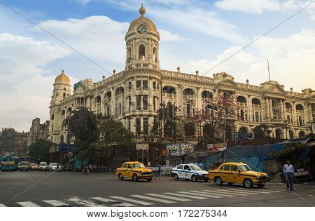 KOLKATA, INDIA -FEBRUARY 12, 2017: Morning city traffic in front of Metropolitan heritage architectural building at Esplanade Kolkata, India.