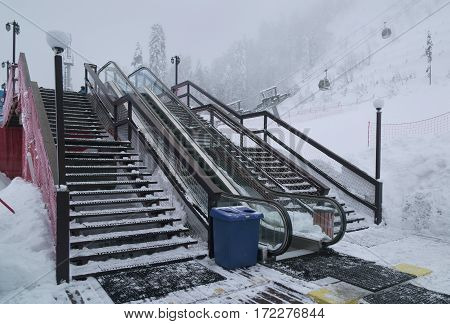Sochi, Russia - January 21, 2017: Stairs and escalators on the slope of the ski resort Gorky Gorod