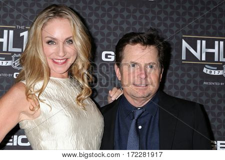 LOS ANGELES - JAN 27:  Tracy Pollan, Michael J. Fox at The NHL100 Gala at Microsoft Theater on January 27, 2017 in Los Angeles, CA