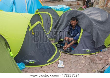 KOS ISLAND, GREECE - SEP 27, 2015: Unknown refugees arriving in Greece by inflatable boats from Turkey. Kos island is located just 4 kilometers from the Turkish coasts.