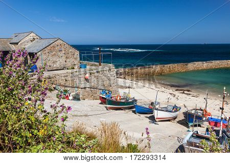 Small fishing boats in the harbour at Sennen Cove Cornwall England UK Europe