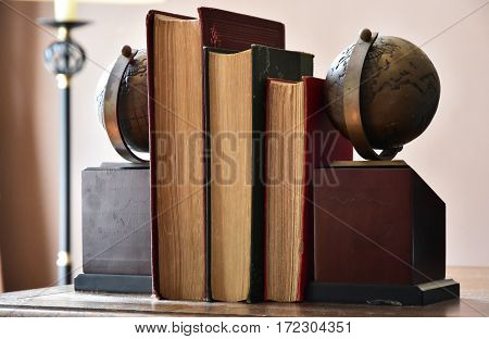 Scenery of a book and the bookends on the table of the study