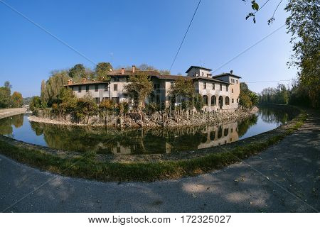Country house along the Naviglio Grande of Turbigo (Milan Lombardy Italy) at fall. Fisheye
