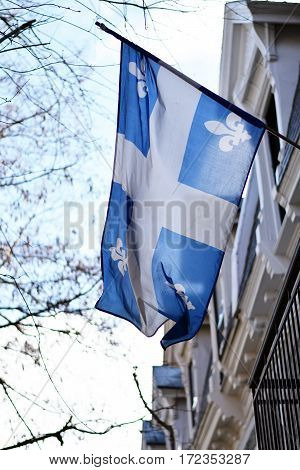 Quebec Flag In Montreal Billowing In The Breeze