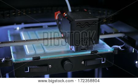 Three dimensional printing machine. 3D printer during work