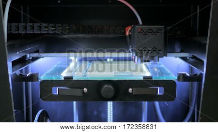 Three dimensional printing machine. 3D printer during work