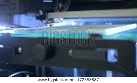 Three dimensional printing machine. 3D printer during work