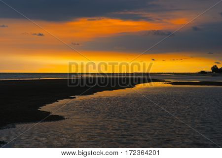 Beach and sea with twilight sky at Chao Lao Beach at Chantaburi Thailand. Summer concept with orange sky sunset scence