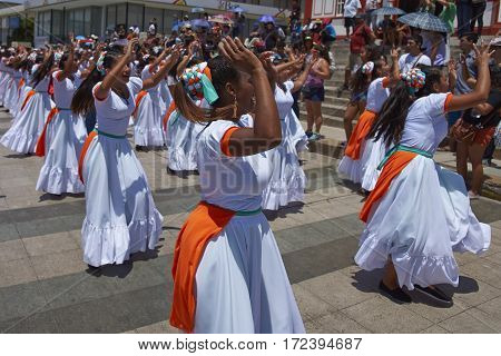 ARICA, ARICA and PARINACOTA, CHILE - FEBRUARY 10, 2017: Female dancers from the group Tumba Carnaval, performing at the annual street carnival celebrating the strength of the sun.