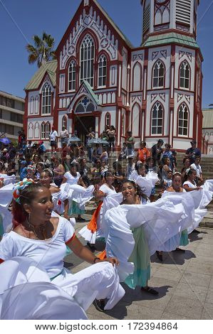 ARICA, ARICA and PARINACOTA, CHILE - FEBRUARY 10, 2017: Female dancers from the group Tumba Carnaval, performing at the annual street carnival celebrating the strength of the sun.