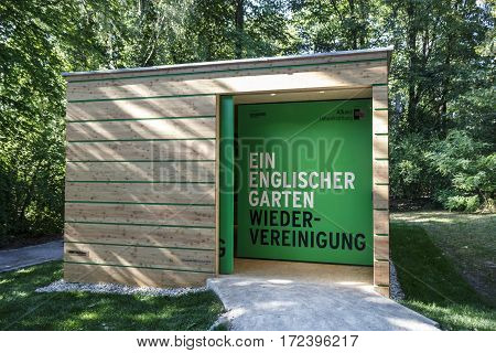 MUNICH, GERMANY - AUGUST 02, 2015: Information desk building in the English Garden aiming to reunite the park which is divided by the Isarring road into two parts