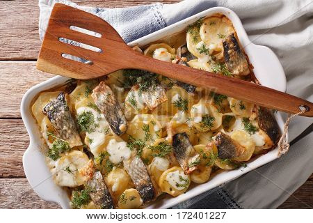 Casserole Of Potatoes, Herring In Cream Sauce In Baking Dish. Horizontal Top View