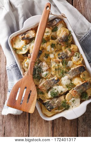 Casserole Of Potatoes, Herring In Cream Sauce In Baking Dish. Vertical Top View