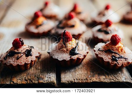 Delicious Chocolate Cupcakes With Berries On Wodeen Table, Top V