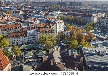MUNICH, GERMANY - OCTOBER 31, 2015: Aerial view on the at the Viktualienmarkt a typical farmers market in the inner city of Munich