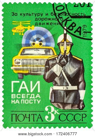 MOSCOW RUSSIA - February 18 2017: A stamp printed in USSR (Russia) shows policeman traffic-controller and car series 
